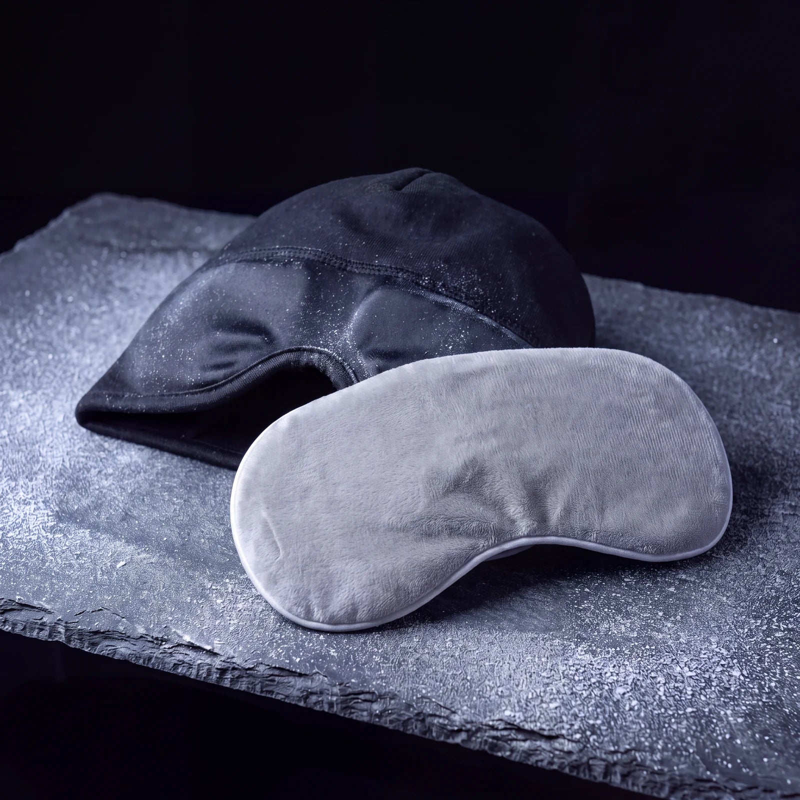 The Nimbus Cap and the grey warm eye mask together on slate